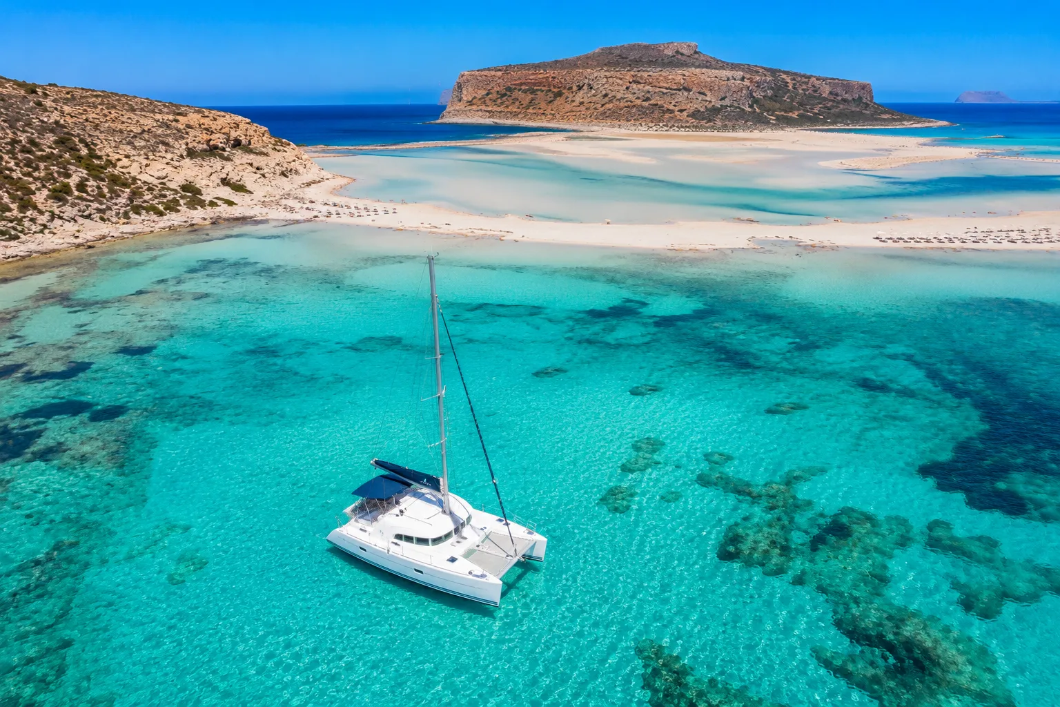 lagoon 380 in balos lagoon aerial photo